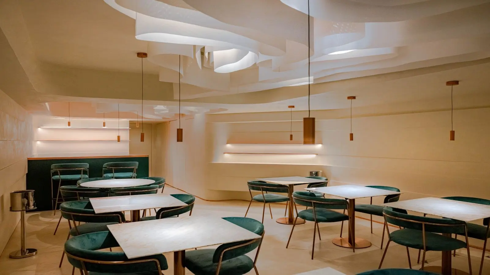 Restaurant with a sculpted wave ceiling