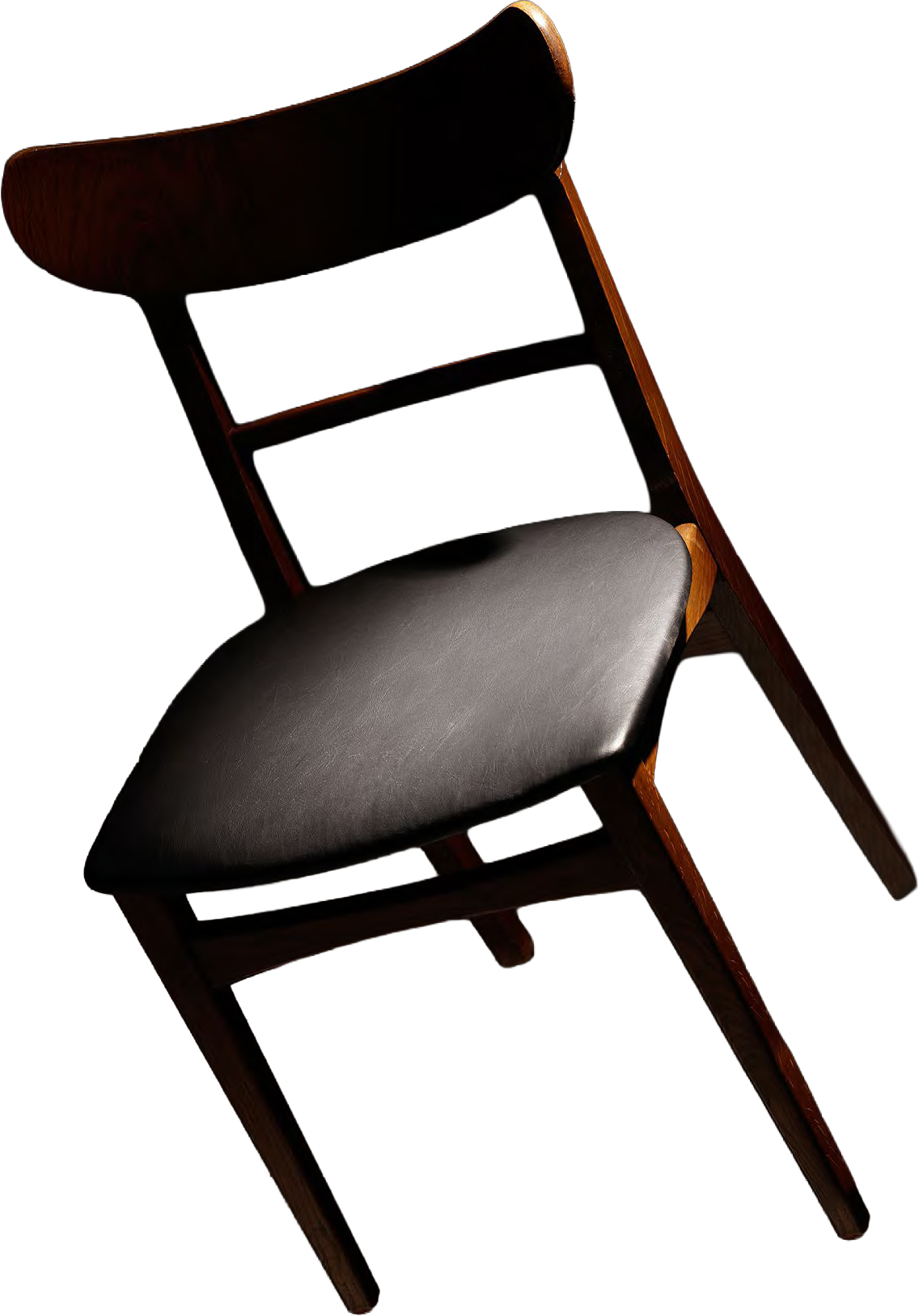 A chair lit by a single focused beam